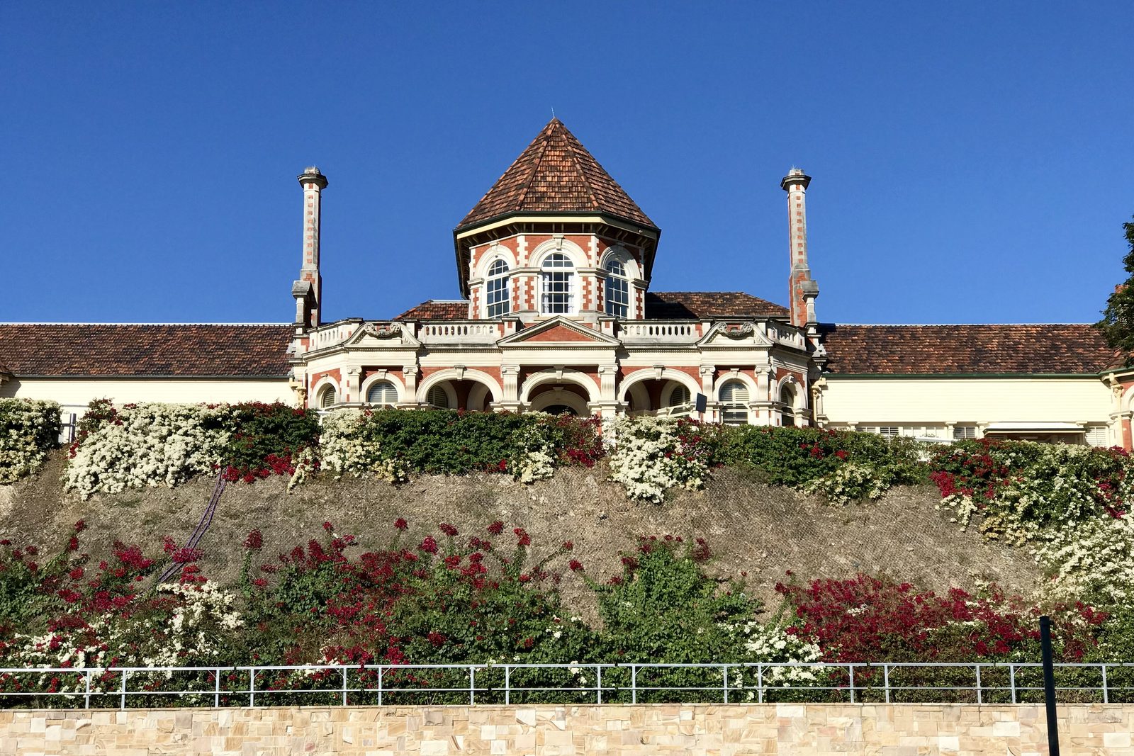 Cumbooquepa, the heritage house at Somerville House in South Brisbane, above a terraced garden